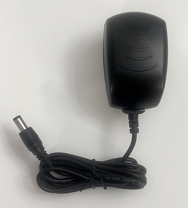 Portable Ultrasound PM 2000 device with AC adapter, gel, and carrying case.