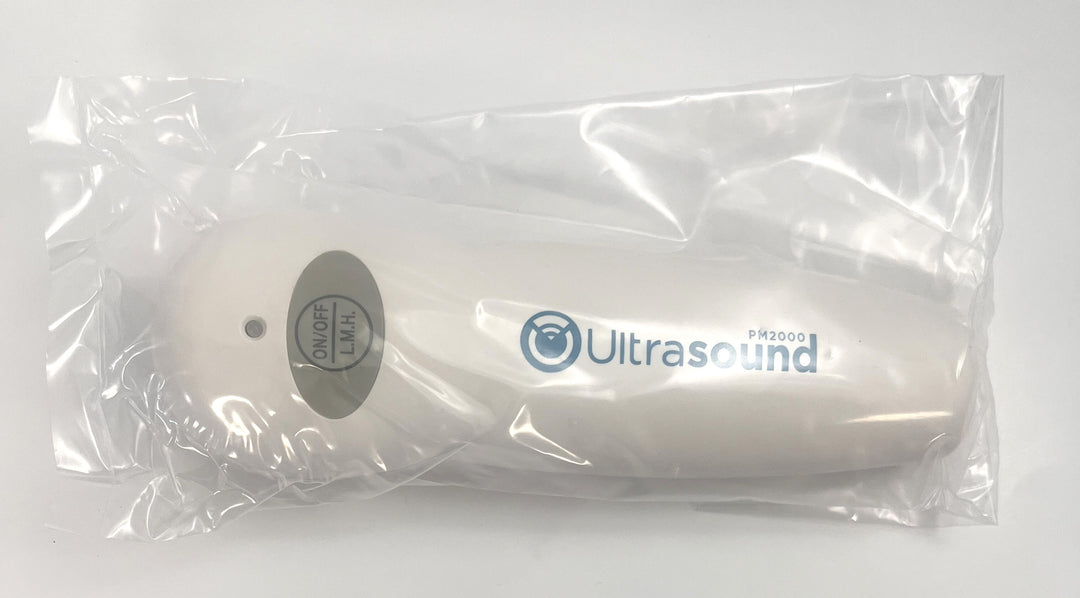 Portable Ultrasound PM 2000 device with AC adapter, gel, and carrying case.
