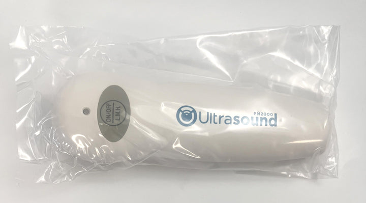 Portable Ultrasound PM 2000 device with AC adapter, gel, and carrying case.