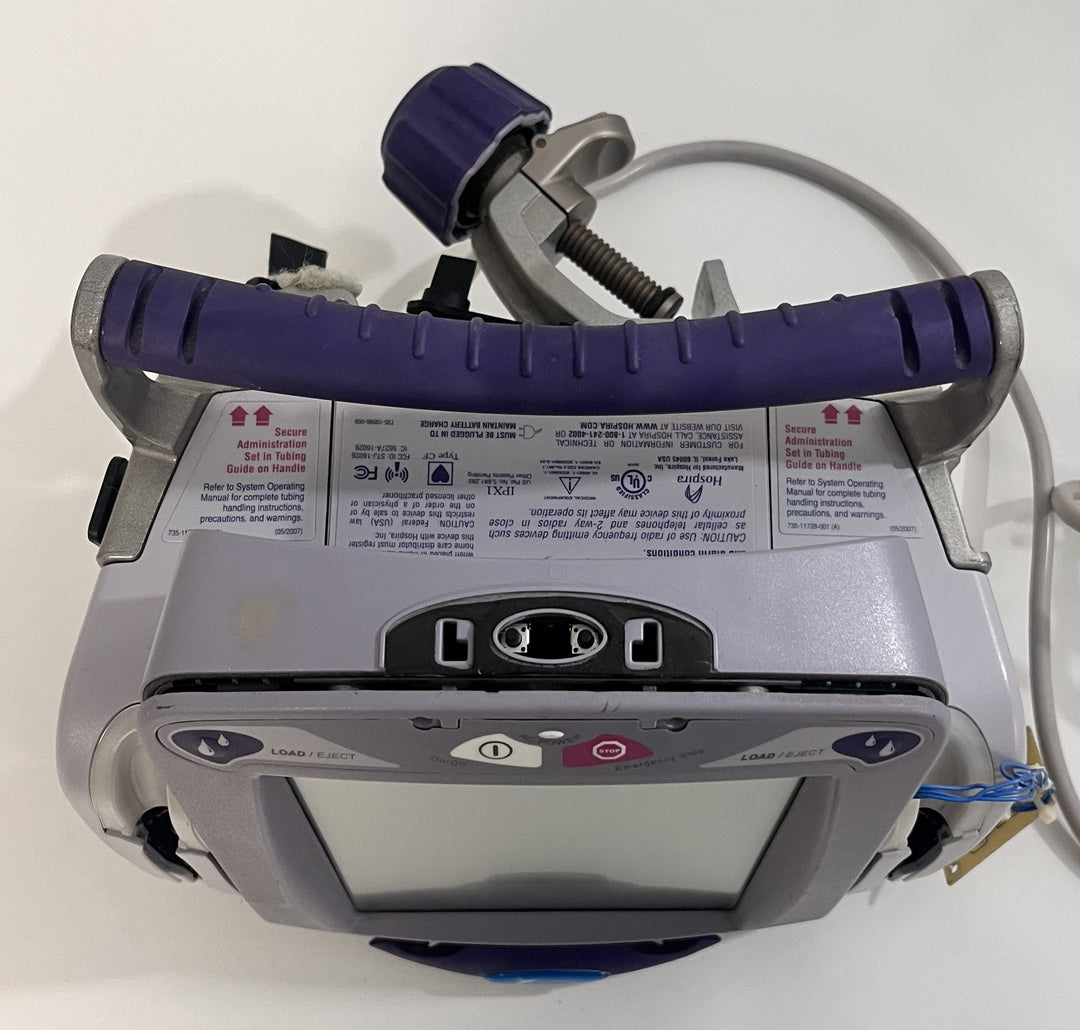Pre-Owned Hospira Symbiq IPX1 Dual Channel Infusion Pump System AS-IS. NO RETURNS.