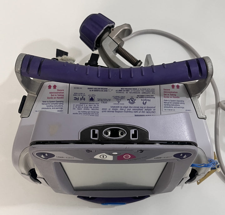 Pre-Owned Hospira Symbiq IPX1 Dual Channel Infusion Pump System AS-IS. NO RETURNS.