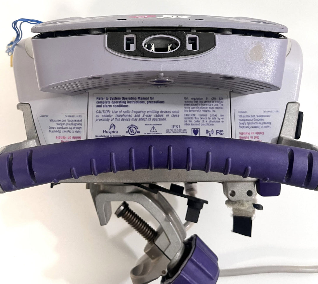 Pre-Owned Hospira Symbiq IPX1 Dual Channel Infusion Pump System AS-IS. NO RETURNS.