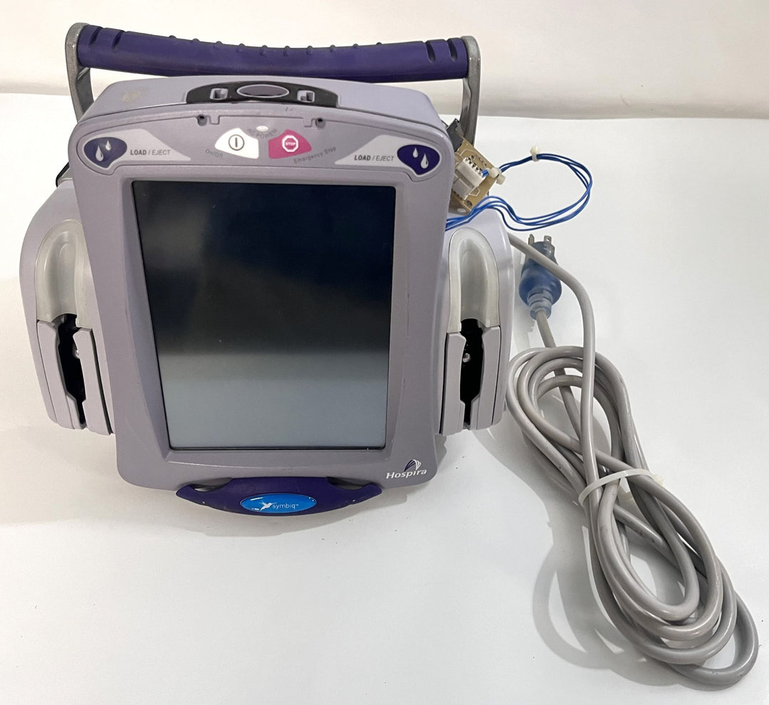 Pre-Owned Hospira Symbiq IPX1 Dual Channel Infusion Pump System AS-IS. NO RETURNS.