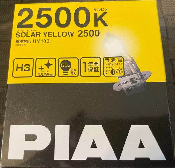 PIAA 22-13403 Solar Yellow H3 light bulb, 2500K, 12V 55W, 2-pack, ideal for improved visibility in foggy or low-light conditions.