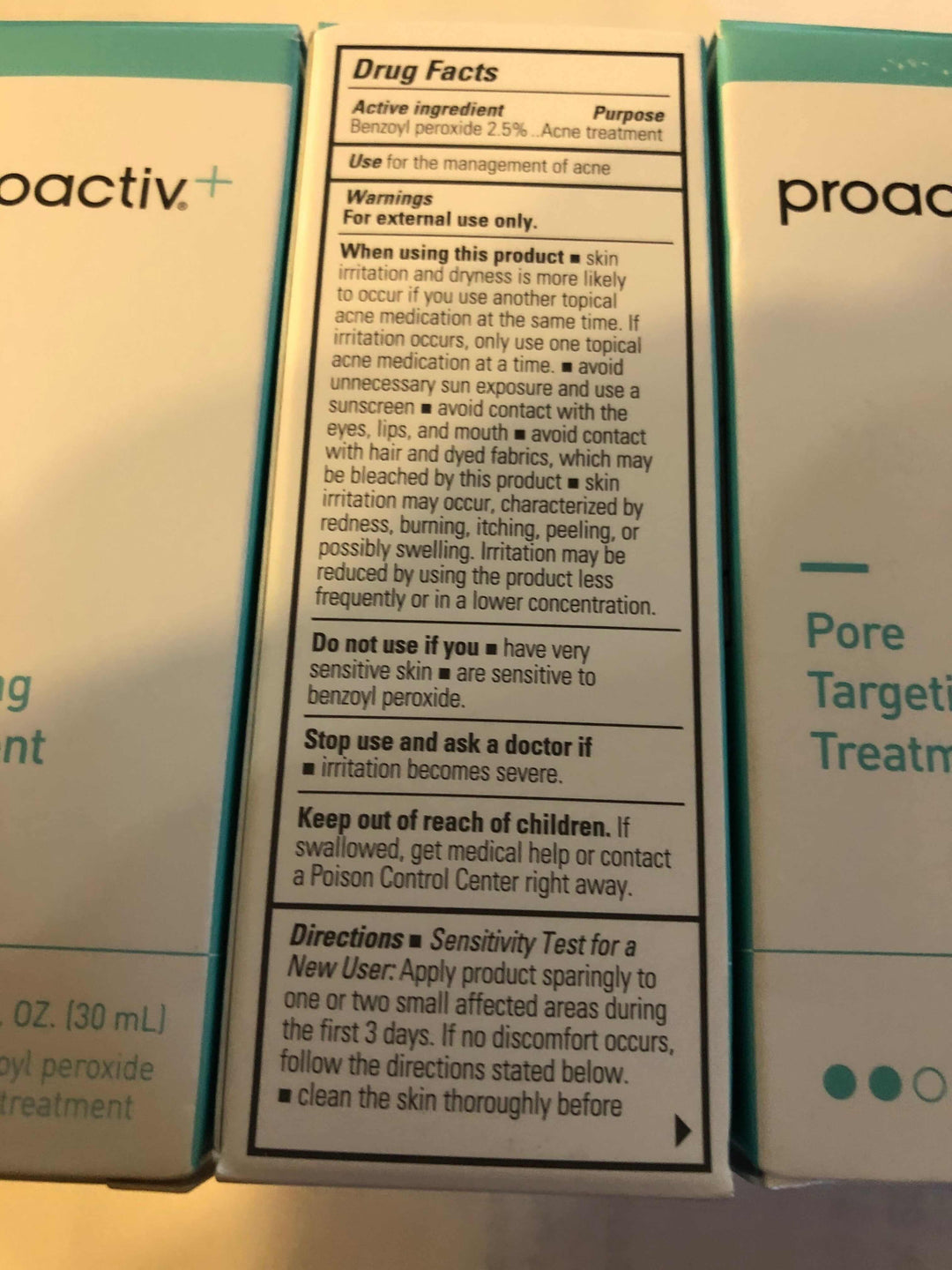 3 bottles of Proactiv+ Pore Targeting Treatment, 1 fl oz each, expiration date: 10/22.