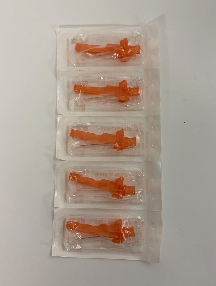 Five individually sealed sterile safety needles with orange plastic hubs, arranged vertically on a white surface, supplied by Yangzhou Medline Industry.