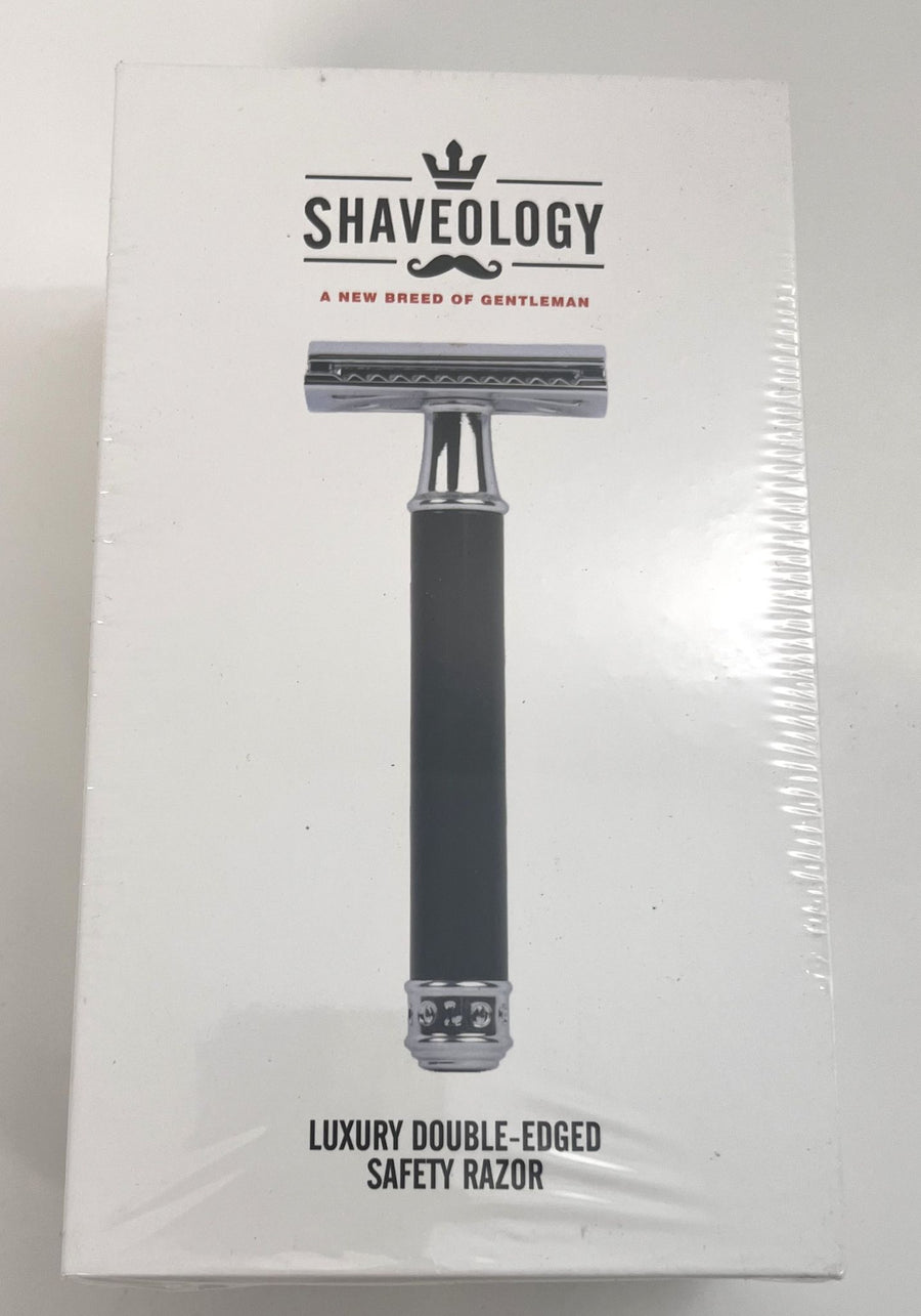 Shaveology Phantom Series Luxury Double-Edged Safety Razor for Men with chrome finish and accessories.