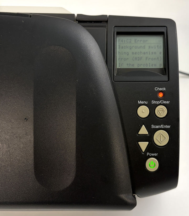 Fujitsu fi 7160 desktop document scanner control panel powered on with an F4 C2 hardware error displayed for parts or repair