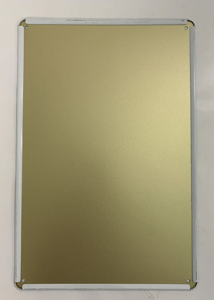 Blank gold metal sign with white border and rounded corners, designed for customization or decoration, suitable for industrial or home use.