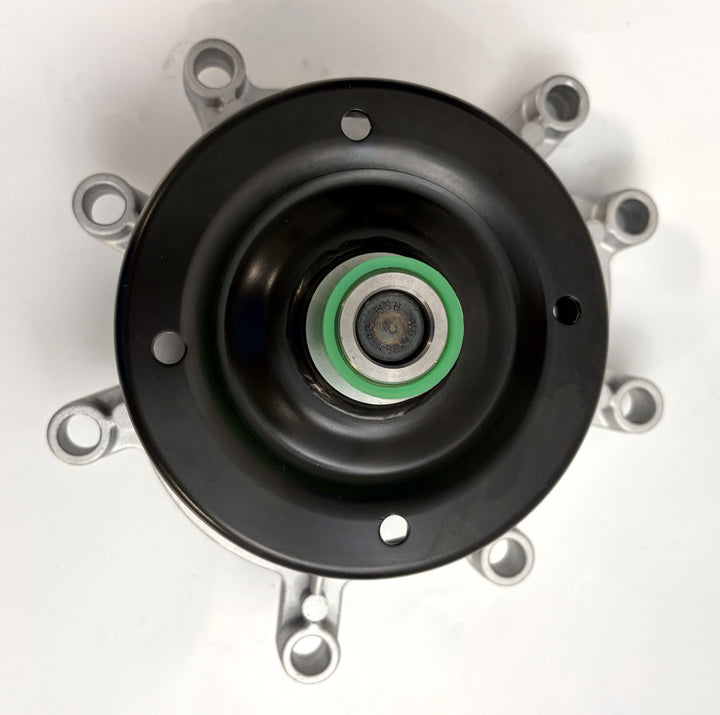 Close-up view of a NAPA engine water pump showing the metal impeller and mounting points, designed for Jeep and Dodge 3.7L and 4.7L engines.