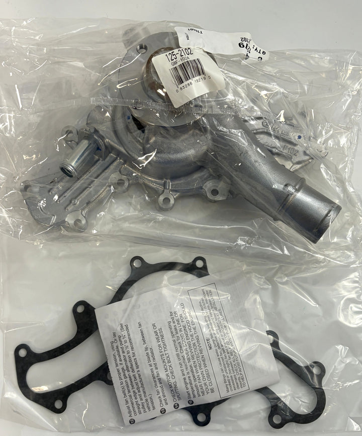 NAPA engine water pump with gasket sealed in clear plastic packaging, suitable for automotive repair and replacement.
