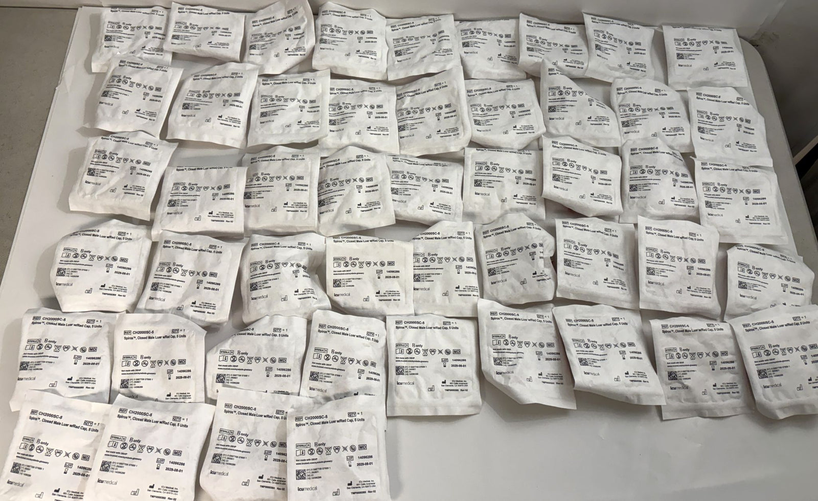 ICU Medical CH2000SC-5 Spiros closed male Luer lock connectors in individually sealed pouches, bulk medical supply lot of 49