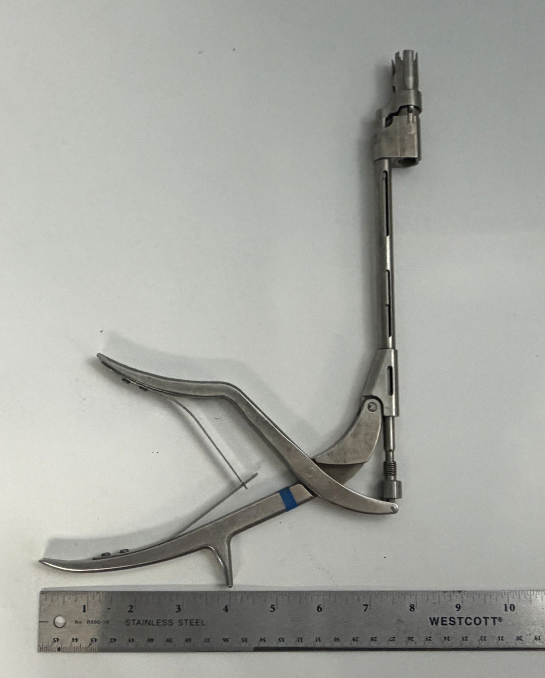 DePuy Synthes Expedium 5.5 spinal rod approximator in stainless steel with articulated jaws and shaft pre owned orthopedic surgical instrument