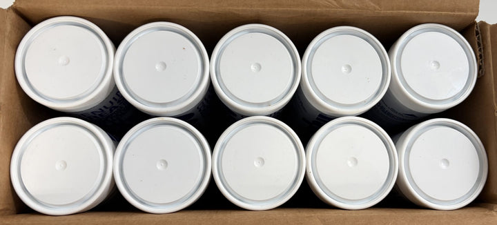 Open cardboard box containing ten white cylindrical Komatsu grease containers with matching lids arranged in two rows