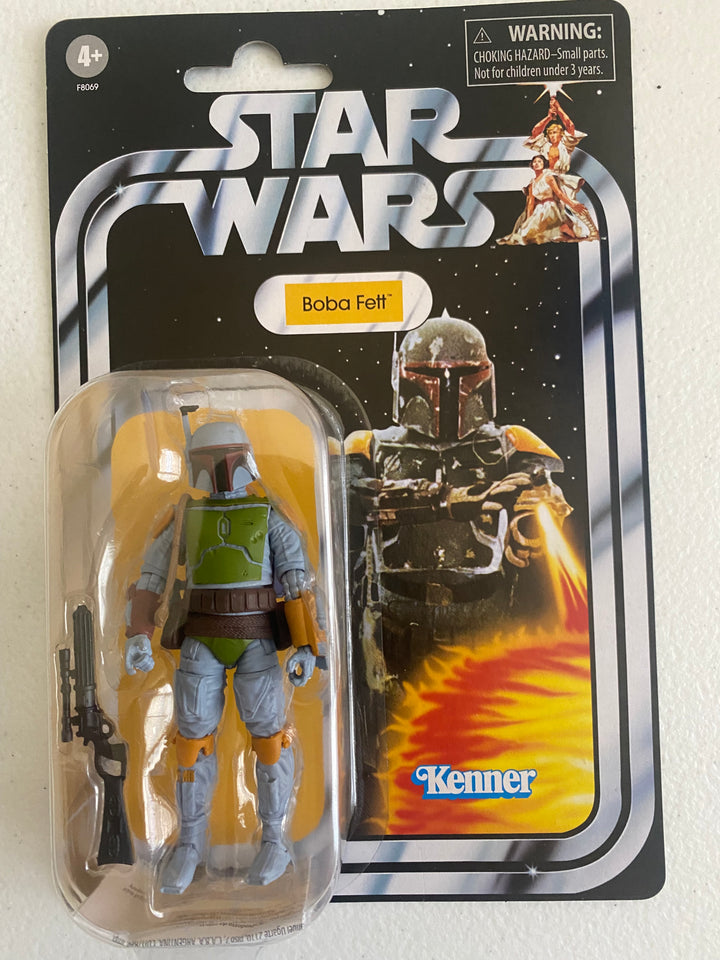 Star Wars Vintage Collection Boba Fett 3.75" action figure (VC275) on mint-on-card (MOC) packaging, inspired by Kenner design.