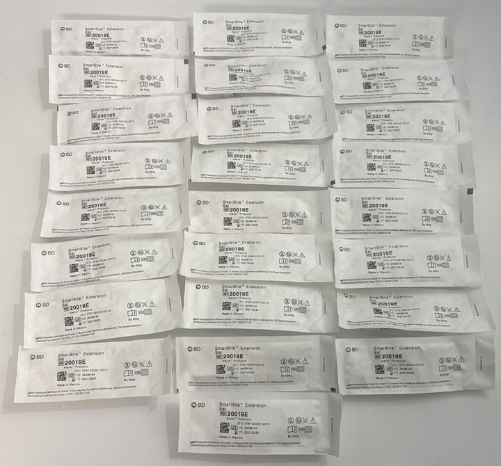 BD 20019E SmartSite smallbore extension sets in individually sealed medical packages, arranged together for healthcare use