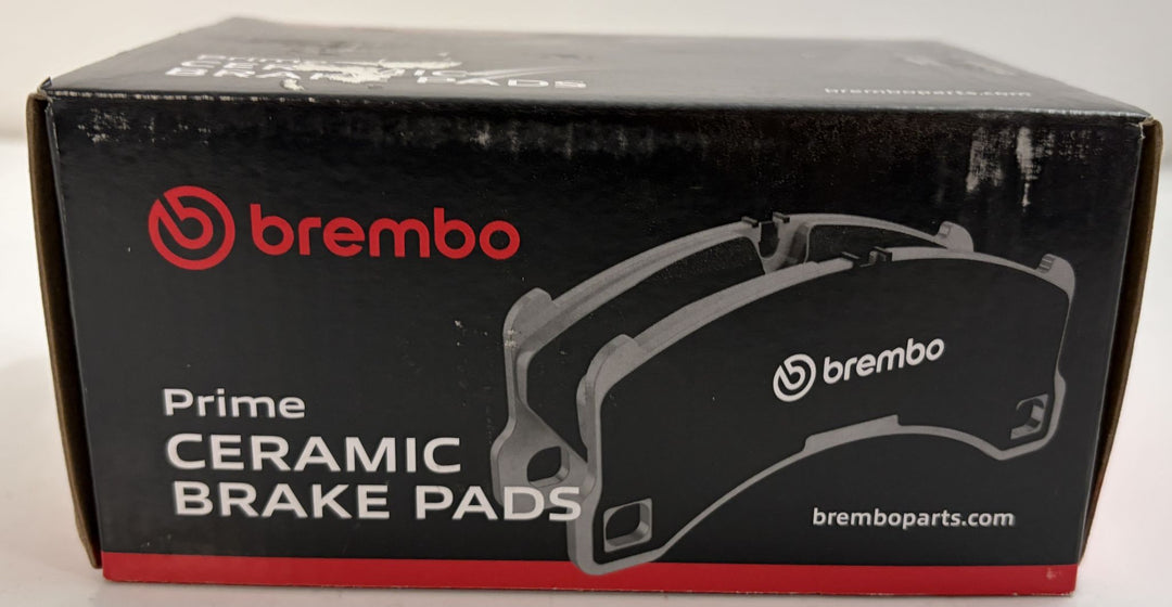 Brembo Prime ceramic brake pads box in black and red automotive packaging with brake pad illustration and Brembo branding
