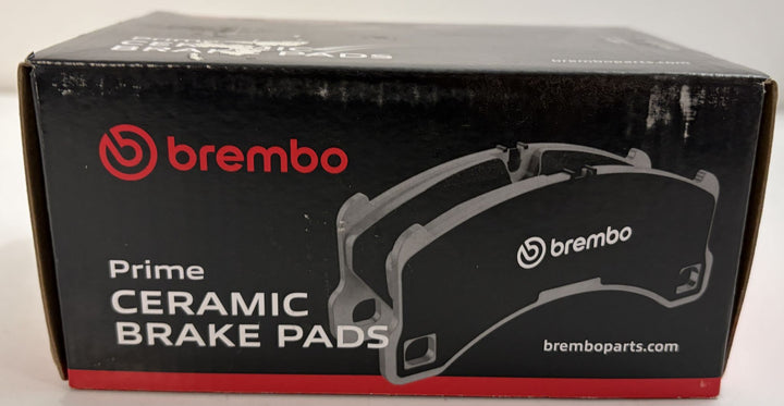 Brembo Prime ceramic brake pads box in black and red automotive packaging with brake pad illustration and Brembo branding