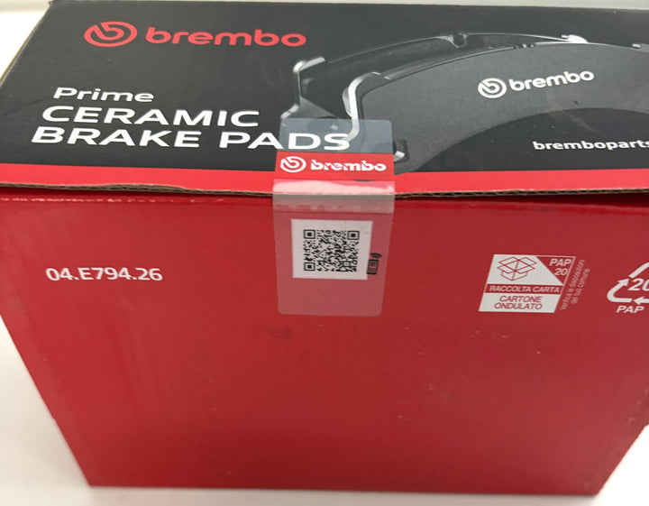 Brembo Prime Ceramic front brake pads box in red and black automotive packaging, marked 04.E794.26 with a QR code and recycling label