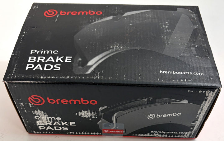 Brembo P85144 Prime low metallic front brake pad set box for Audi A3 and VW Golf VIII, with black packaging and visible scuffs