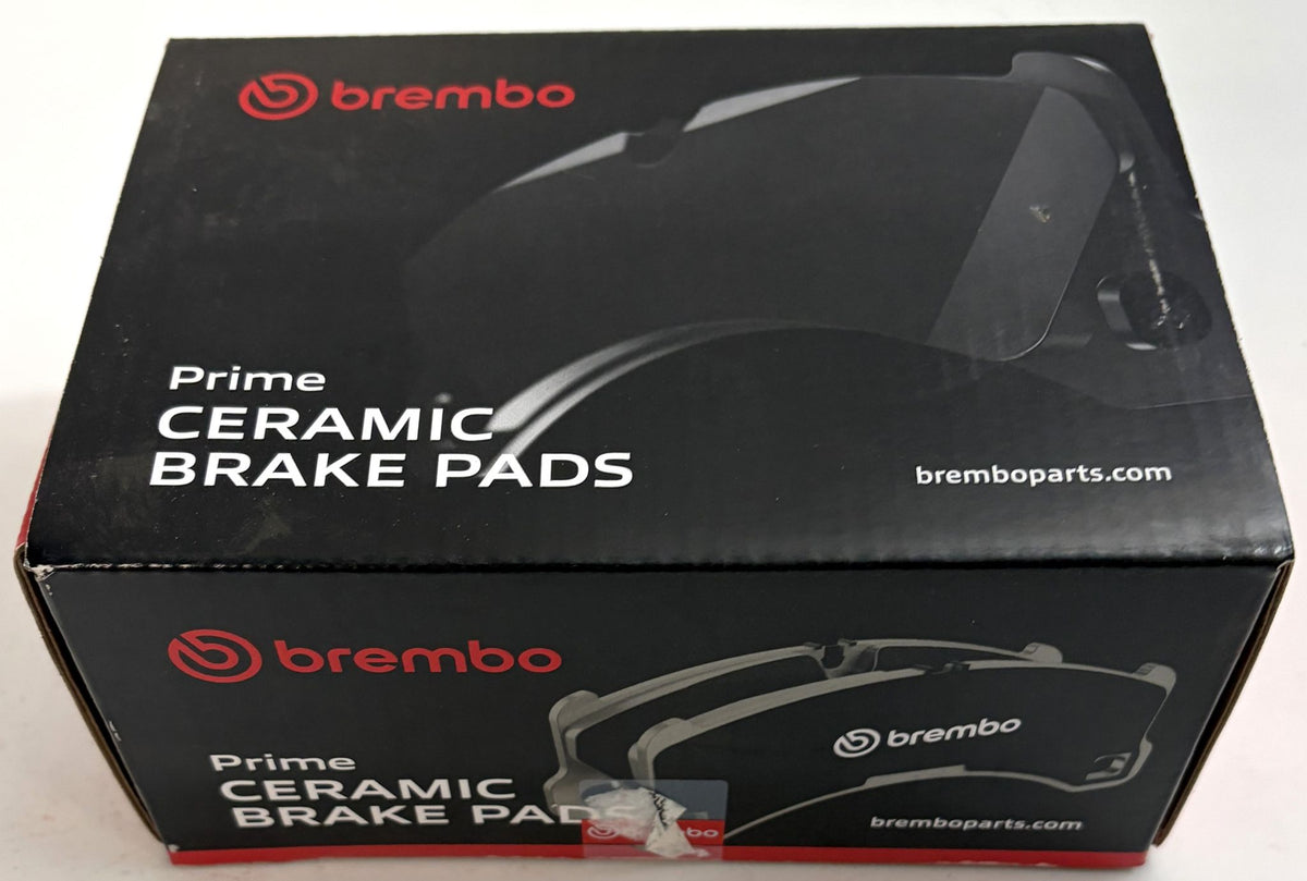 Brembo Prime Ceramic Brake Pads in black automotive packaging, with brake pad graphics and branded box design for a front brake pad set