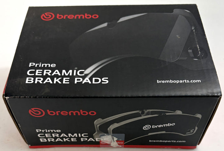 Brembo Prime Ceramic Brake Pads in black automotive packaging, with brake pad graphics and branded box design for a front brake pad set