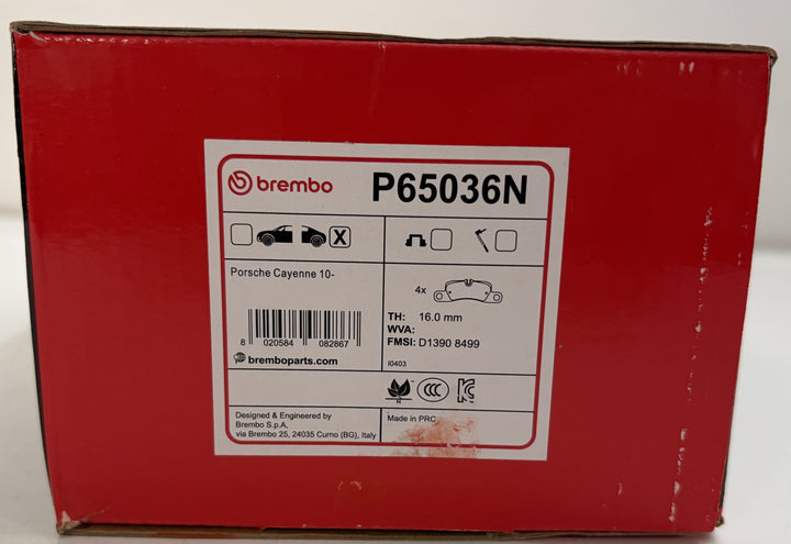 Red Brembo automotive parts box labeled P65036N for Porsche Cayenne, with brake component specifications and barcode on the label