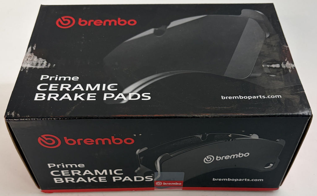 Brembo Prime ceramic brake pads in a black retail box, featuring Brembo branding and BremboParts.com graphics