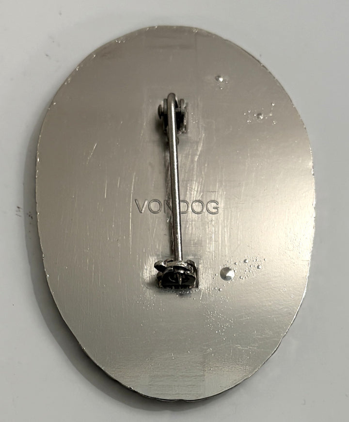 Metallic object with 'VONCOC' branding on a gray background