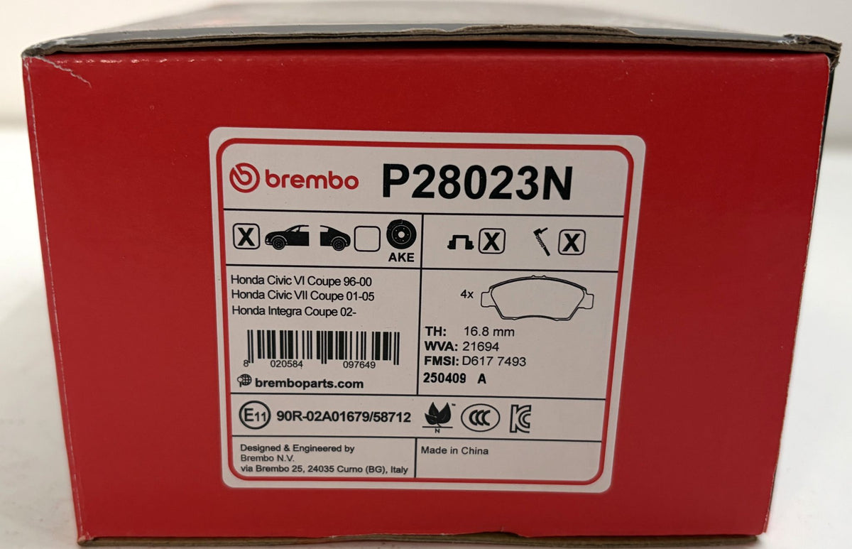 Brembo P28023N ceramic front brake pad set in a red box, labeled for Honda Civic and Integra models.