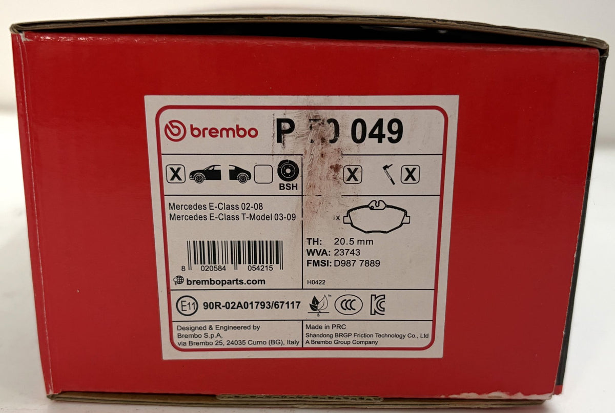 Red Brembo P50049 brake pad box labeled for Mercedes E-Class W210 and W211 models, with pad diagram and automotive part details