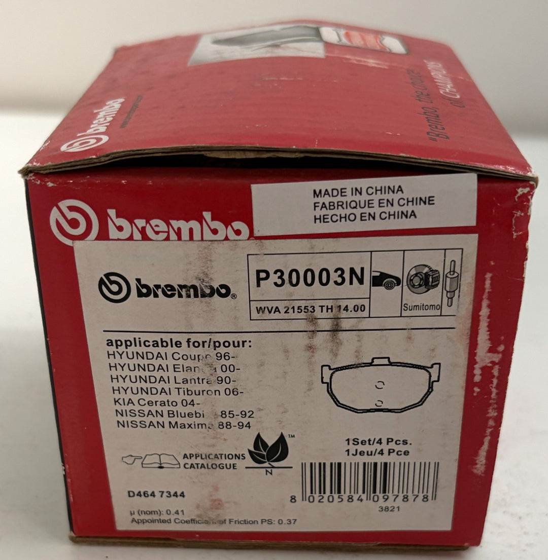 Brembo P30003N ceramic rear brake pad box with red packaging, Hyundai Elantra and Tiburon compatibility label, and barcode