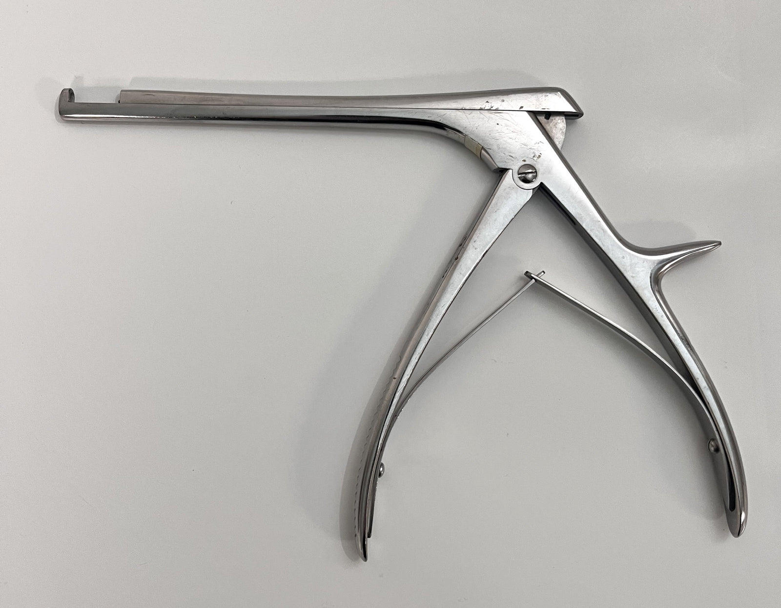 Pre-owned V. Mueller NL 6002 Schlesinger Cervical Punch Rongeur, 10" surgical instrument.