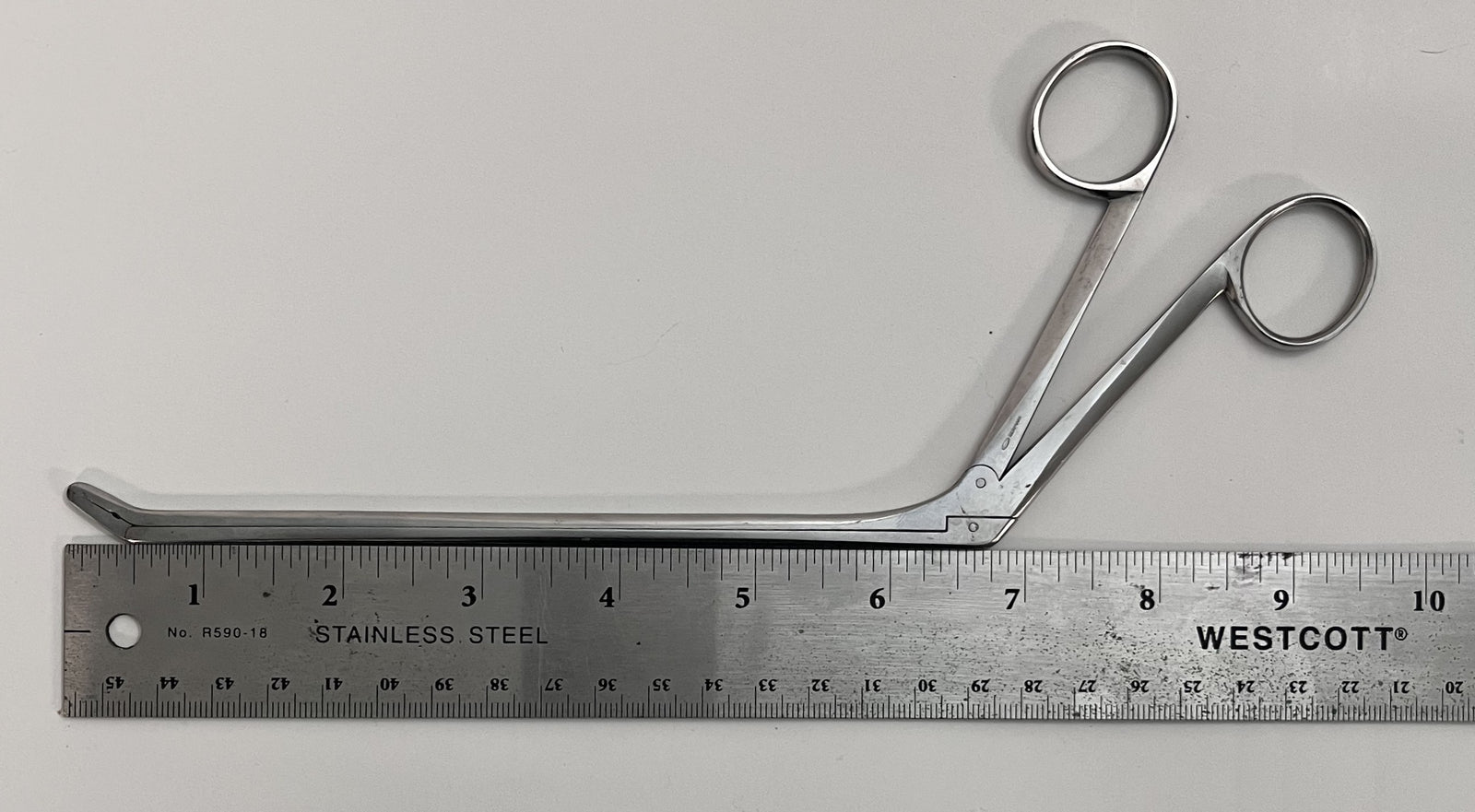 Pre-owned Codman Surgical Rongeur, Angle Down – precision bone-cutting tool for surgical procedures.