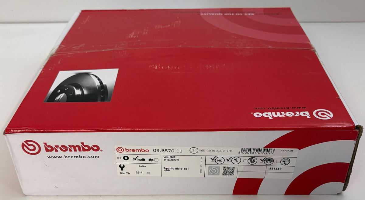 Red and white Brembo automotive brake parts box with visible part number 09.8570.11 and black brake disc illustration on the label
