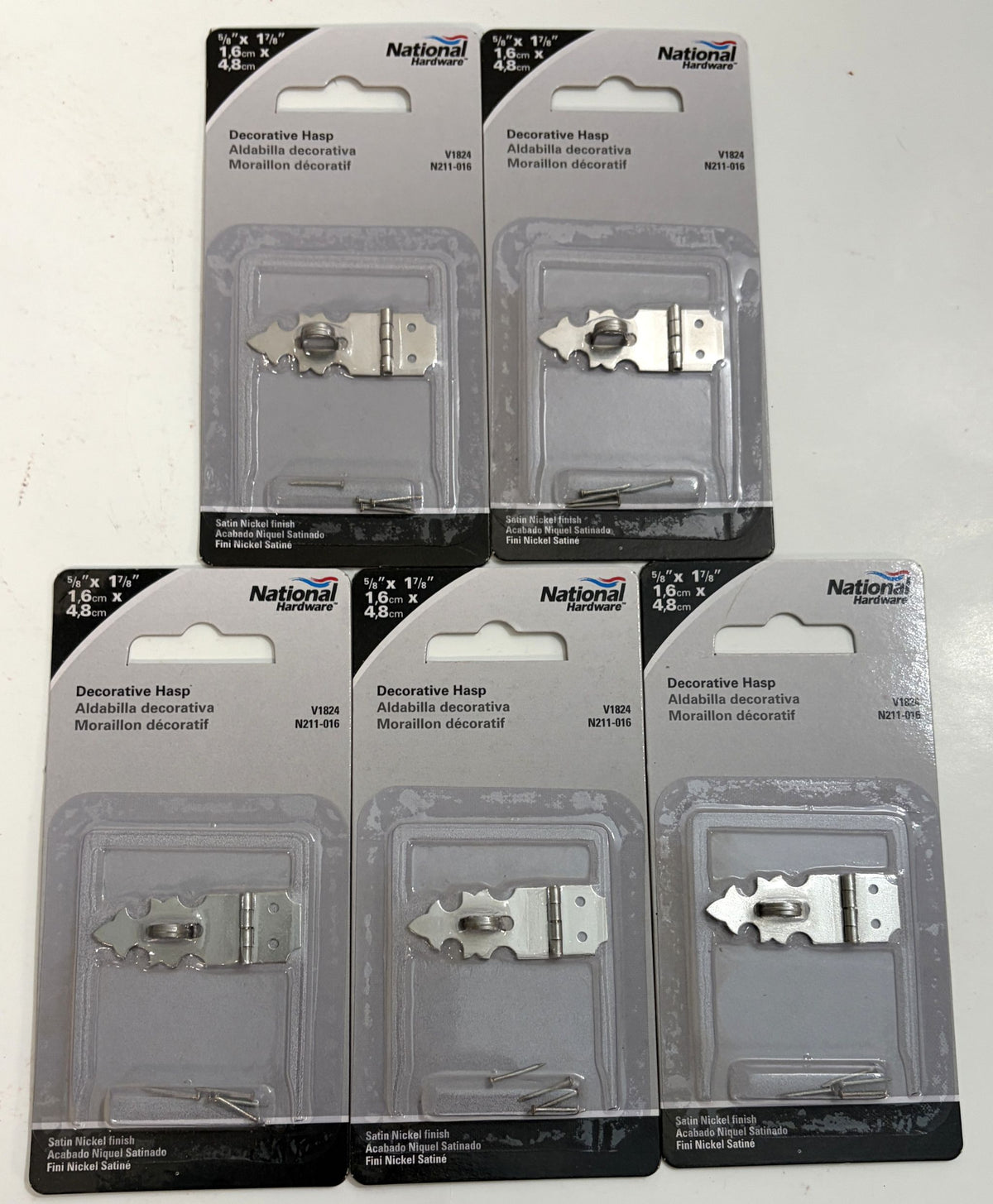 Five National Hardware N211-016 decorative safety hasps in retail packaging, featuring satin nickel finish for cabinets, chests, and woodworking projects