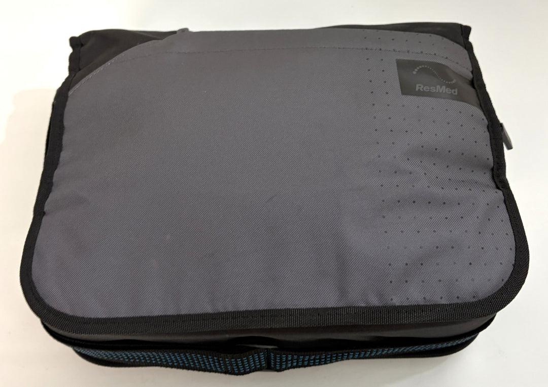 Resmed AirSense 11 AutoSet gray and black zippered carrying case for pre owned medical equipment with padded handle and logo