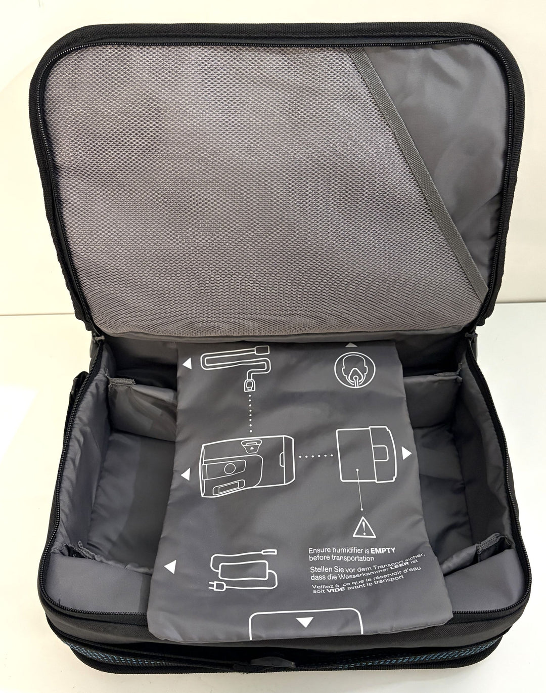 Open black Resmed AirSense 11 AutoSet carrying case with equipment instruction panel, pre owned medical CPAP accessory