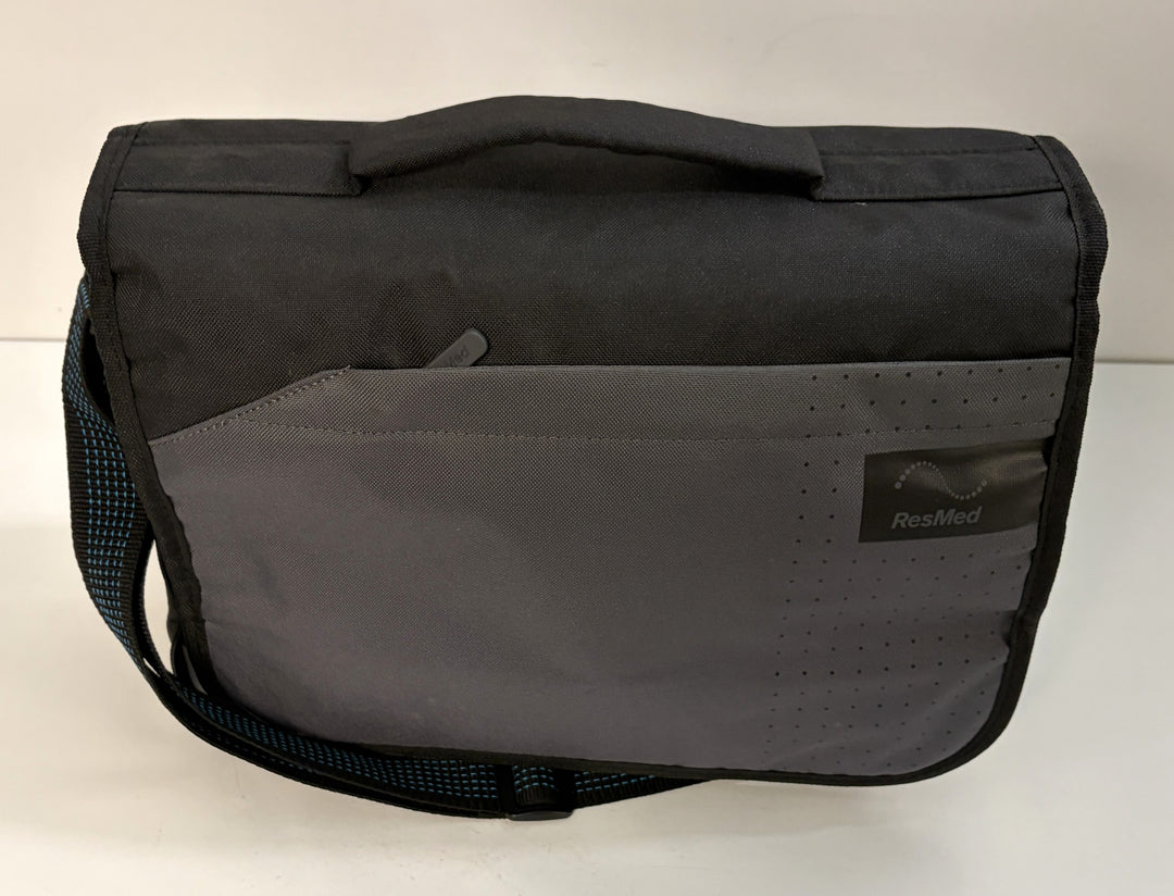 ResMed black and gray carrying case for AirSense 11 AutoSet medical CPAP equipment, pre-owned with shoulder strap and front pocket