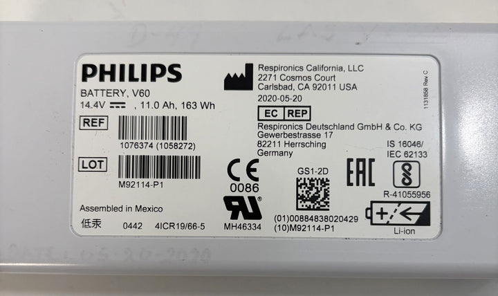 Philips V60 battery label showing 14.4 volt, 11.0 amp hour, 163 watt hour lithium ion battery ratings and regulatory symbols