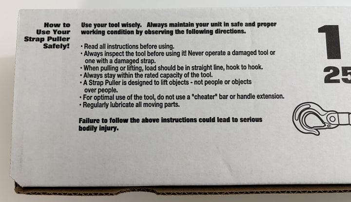 Maasdam strap puller packaging with printed safety instructions, warning guidance, and a partial line drawing of the tool on cardboard.