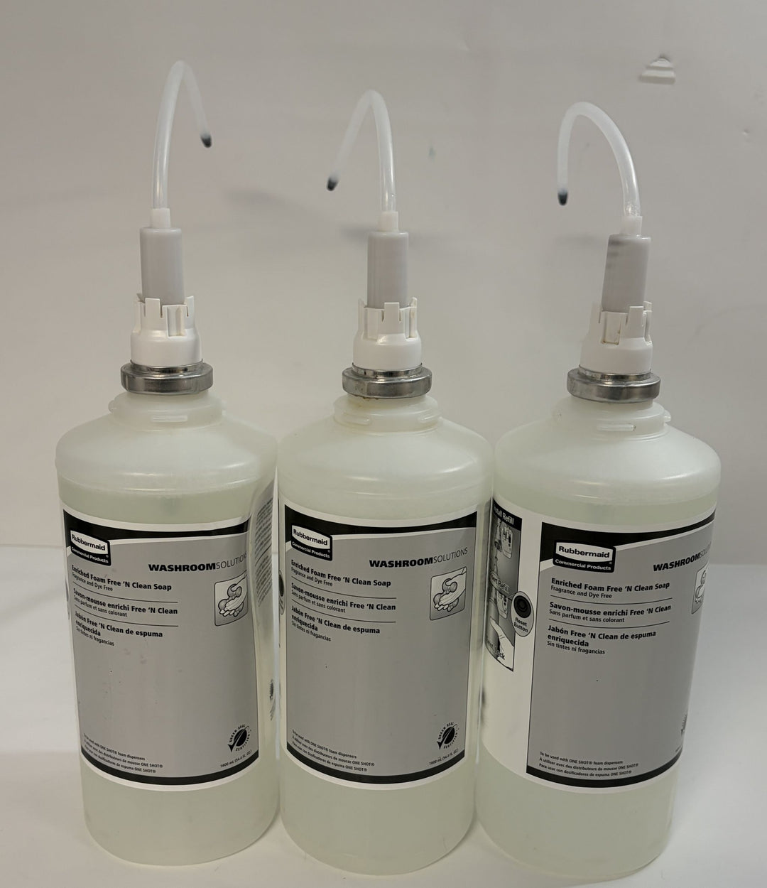 Three Rubbermaid Enriched Foam Free N Clean hand soap refill bottles for commercial washroom dispensers, model FG750390, 1600 ml each