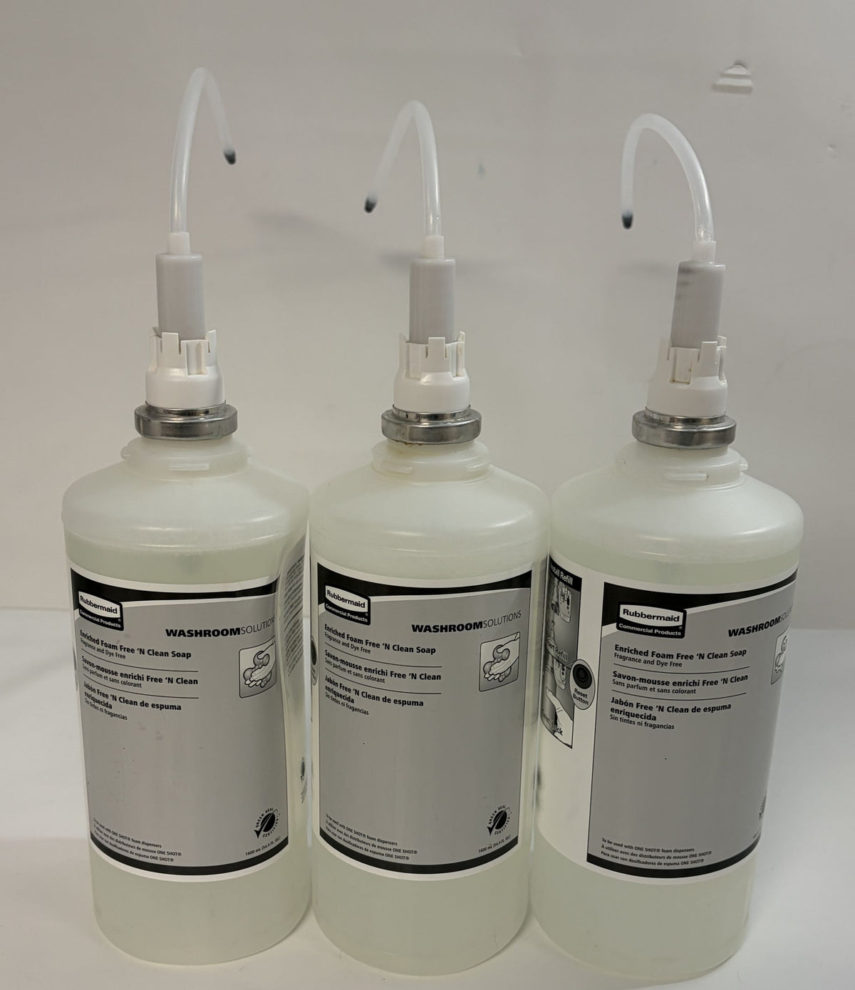 Three Rubbermaid Enriched Foam Free N Clean hand soap refill bottles for commercial washroom dispensers, model FG750390, 1600 ml each