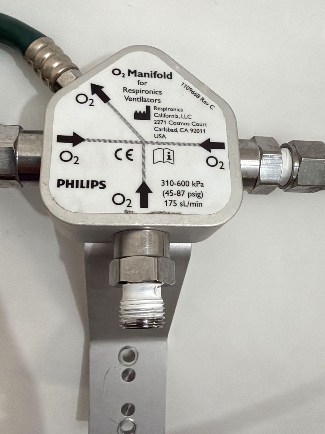 Philips Respironics O2 manifold assembly 1109668 Rev C for V60 ventilators with labeled ports and metal fittings, pre-owned medical equipment from PHENTERSALES