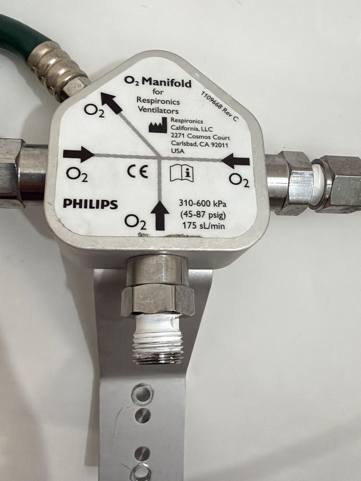 Philips Respironics O2 manifold assembly 1109668 Rev C for V60 ventilators with labeled ports and metal fittings, pre-owned medical equipment from PHENTERSALES