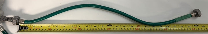 Philips Respironics pre owned O2 manifold hose part 1109668 Rev B with green oxygen tubing and metal connectors beside a measuring tape
