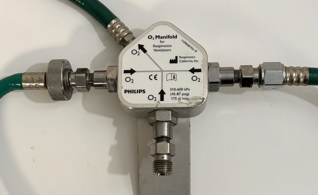 Philips Respironics O2 manifold assembly part number 1109668 Rev B with three green oxygen hoses for V60 ventilators pre owned medical equipment