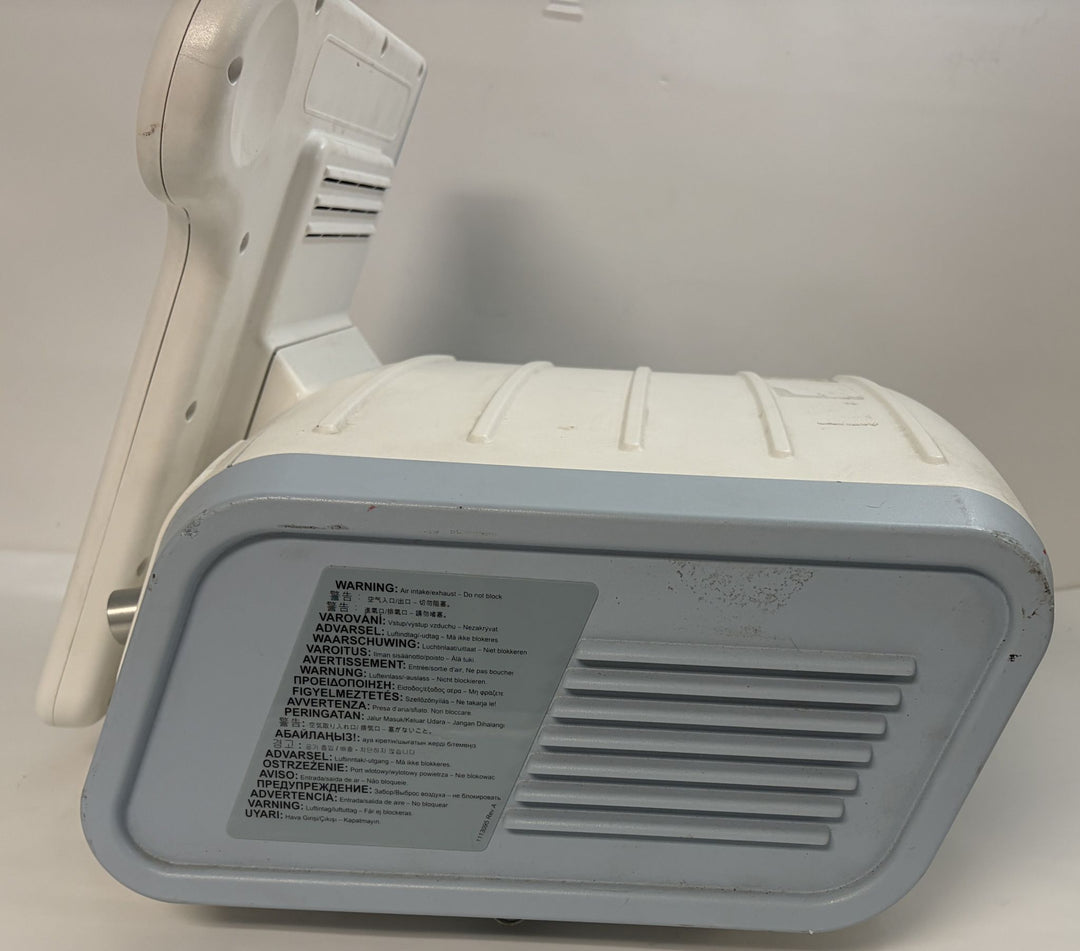 Philips Respironics V60 non invasive ventilator console underside with warning label and ventilation grille, pre owned medical equipment from PHENTERSALES