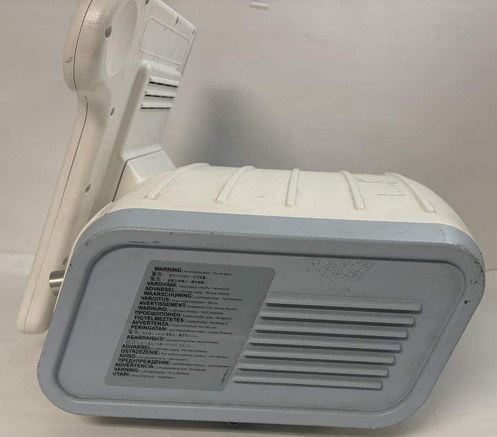 Philips Respironics V60 non invasive ventilator console underside with warning label and ventilation grille, pre owned medical equipment from PHENTERSALES