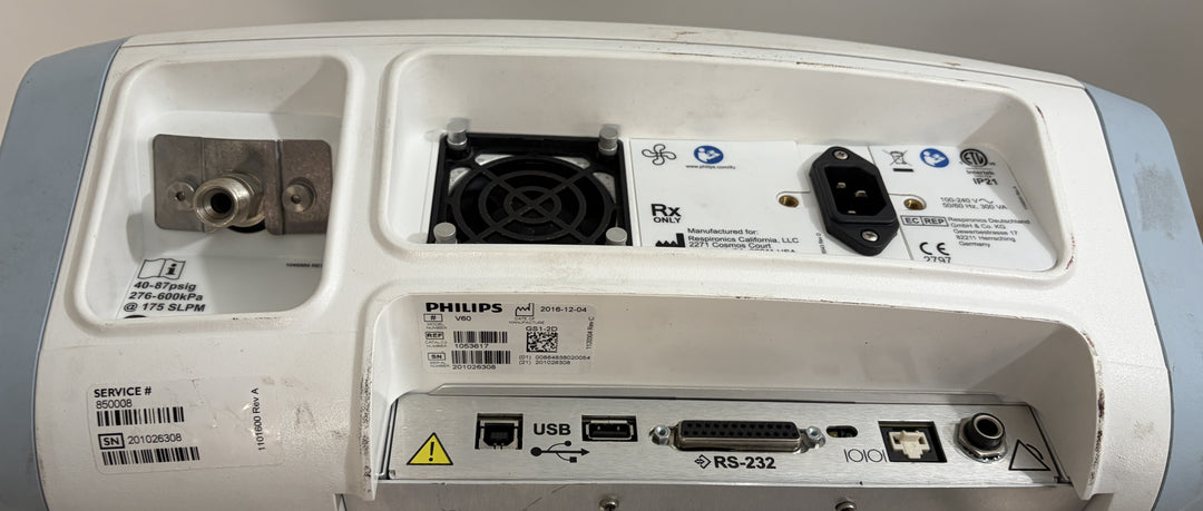 Rear panel of a pre-owned Philips Respironics V60 medical ventilator showing cooling fan, power inlet, USB and RS 232 ports, from PHENTERSALES